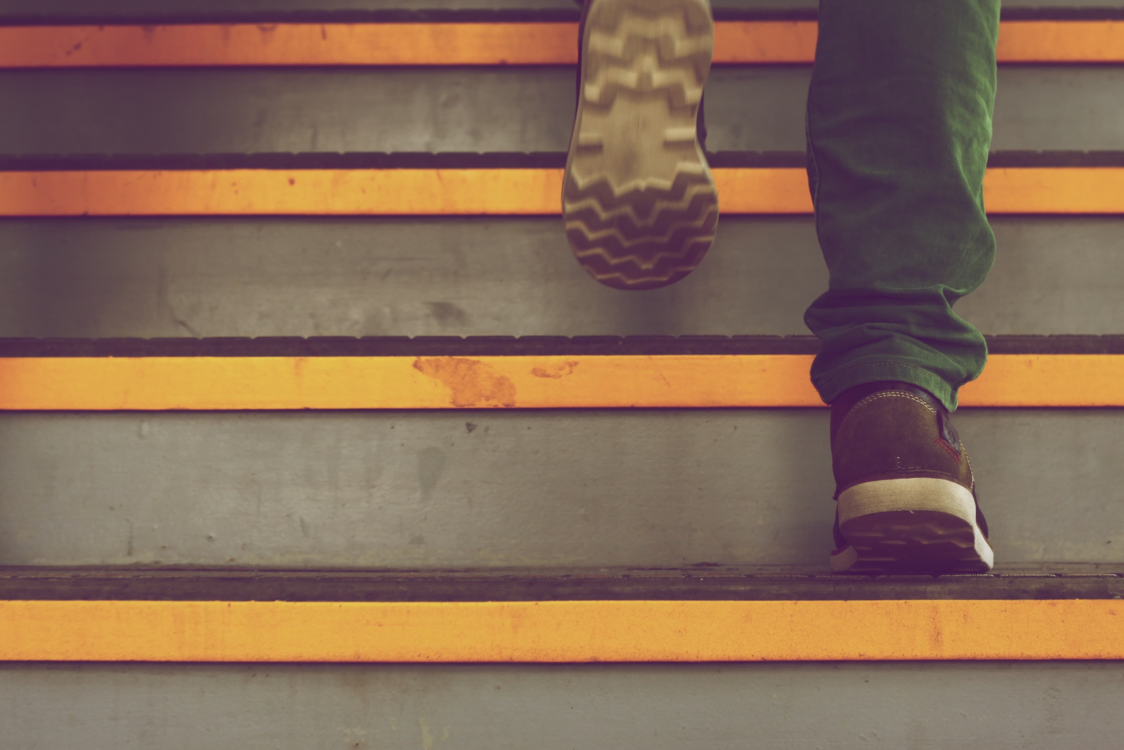 Guy walking up the stairs